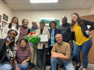 Bella Photo With Staff At Her Anniversary Gathering